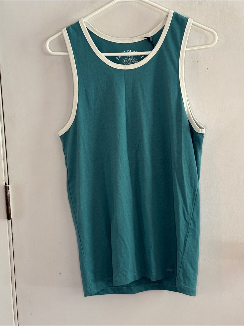Free Planet teal tank top with white trim Size XS